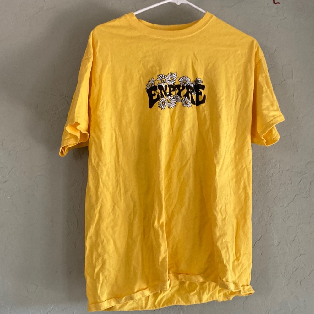 Large unisex graphic tee within double sided graphic